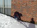 Zack climbing snow drift